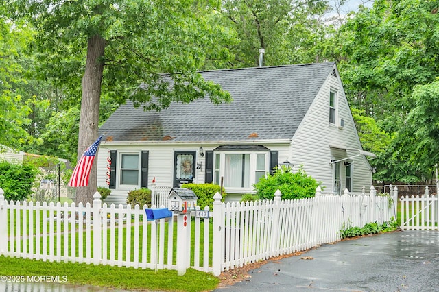 443 Shady Ln, Howell, NJ 07731 - cape cod house with roof with shingles and a fenced front yard