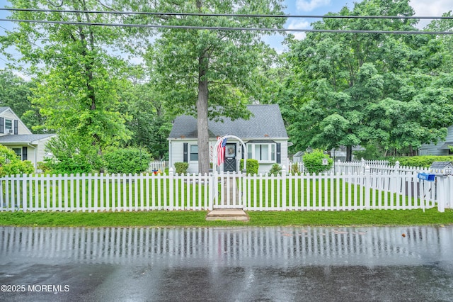 443 Shady Ln, Howell, NJ 07731 - cape cod house with roof with shingles, view of scattered trees, and a water view