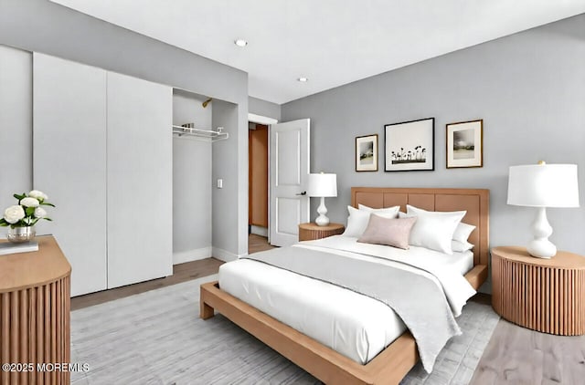 3623 Royce Ct, Hillsborough, NJ 08844 - bedroom with wood finished floors, a closet, and baseboards