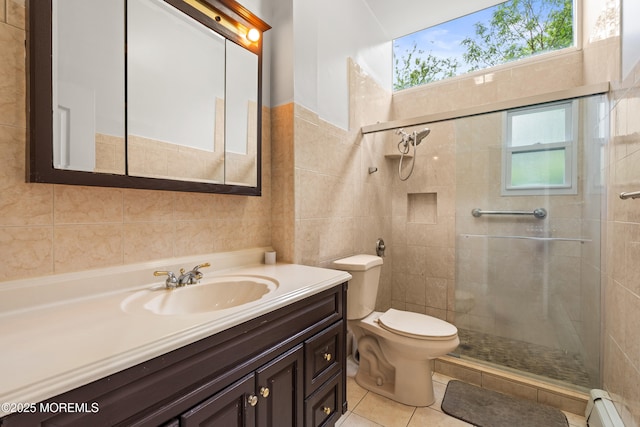 606 Deal Rd, Oakhurst, NJ 07755 - full bath with baseboard heating, tile walls, vanity, and a tile shower