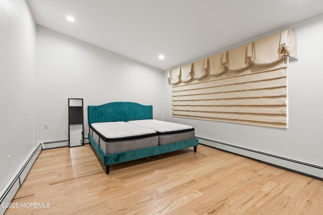 606 Deal Rd, Oakhurst, NJ 07755 - bedroom with a baseboard radiator, light wood-style floors, and recessed lighting