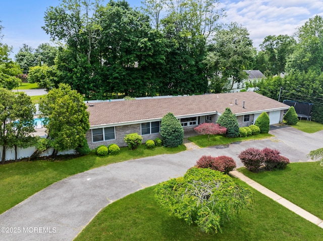 606 Deal Rd, Oakhurst, NJ 07755 - ranch-style home featuring a front yard, a garage, and asphalt driveway