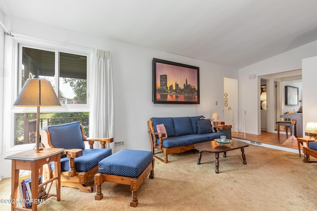 4 Mason Dr, Hazlet, NJ 07730 - living area featuring carpet floors and vaulted ceiling