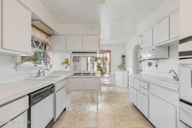 4 Mason Dr, Hazlet, NJ 07730 - kitchen featuring white appliances, a sink, a warming drawer, and plenty of natural light