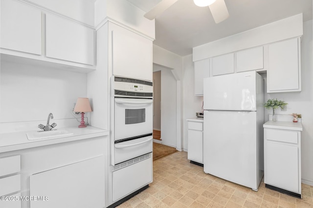 4 Mason Dr, Hazlet, NJ 07730 - kitchen with white appliances, a warming drawer, light countertops, and white cabinets