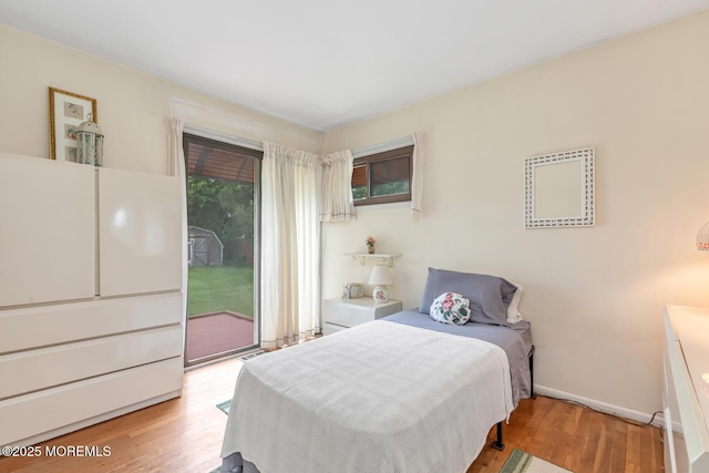 4 Mason Dr, Hazlet, NJ 07730 - bedroom featuring access to exterior, wood finished floors, and baseboards