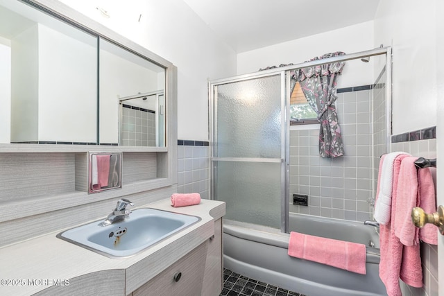 4 Mason Dr, Hazlet, NJ 07730 - bathroom featuring tile walls, shower / bath combination with glass door, vanity, tile patterned flooring, and wainscoting