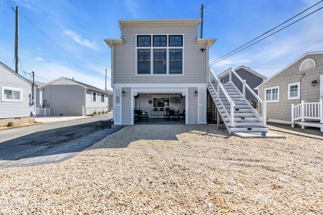 123 W Cove Way, Lavallette, NJ 08735 - view of front of home with stairs, central AC, and an attached garage