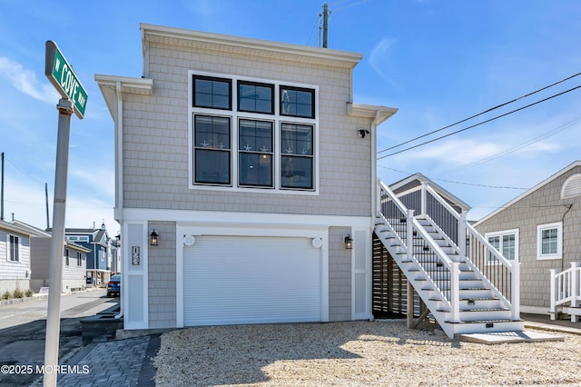 123 W Cove Way, Lavallette, NJ 08735 - view of front of property with a garage, stairway, and driveway