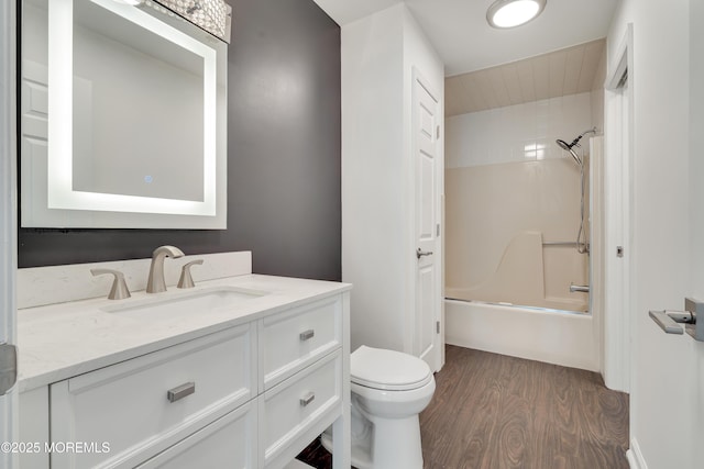 717 Zlotkin Cir Unit 1, Freehold, NJ 07728 - full bathroom featuring wood finished floors, vanity, toilet, and shower / bath combination
