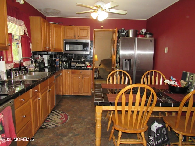 138 N Cooks Bridge Rd, Jackson, NJ 08527 - kitchen with appliances with stainless steel finishes, tile countertops, a sink, ceiling fan, and decorative backsplash