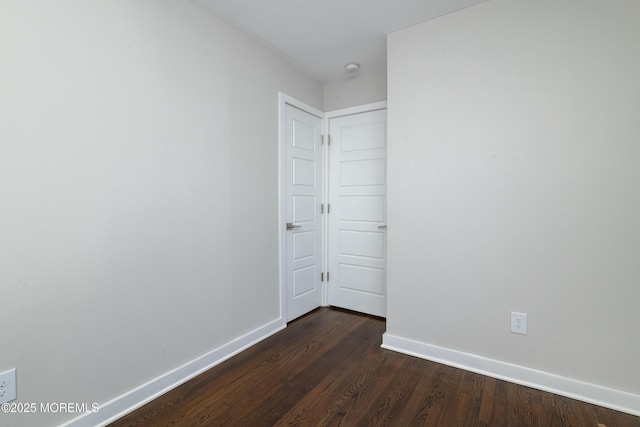 68 Elm St, Beachwood, NJ 08722 - empty room featuring dark wood-style flooring and baseboards