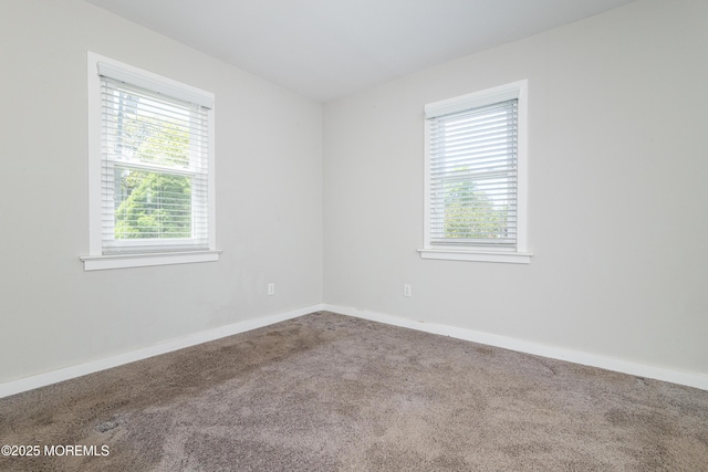 68 Elm St, Beachwood, NJ 08722 - carpeted spare room with baseboards