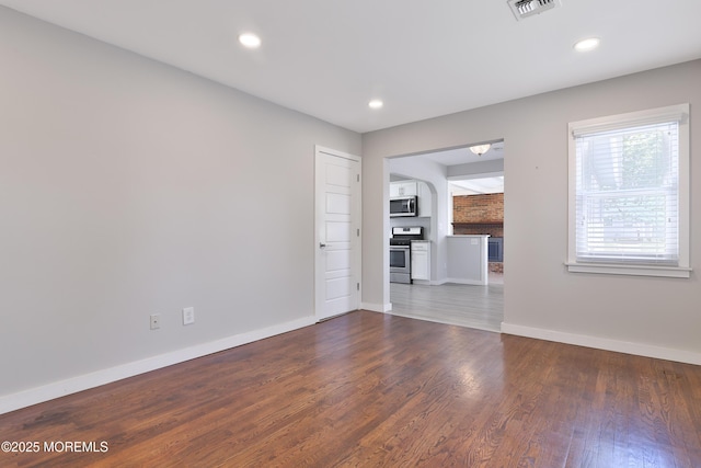 68 Elm St, Beachwood, NJ 08722 - unfurnished living room with baseboards, wood finished floors, and recessed lighting