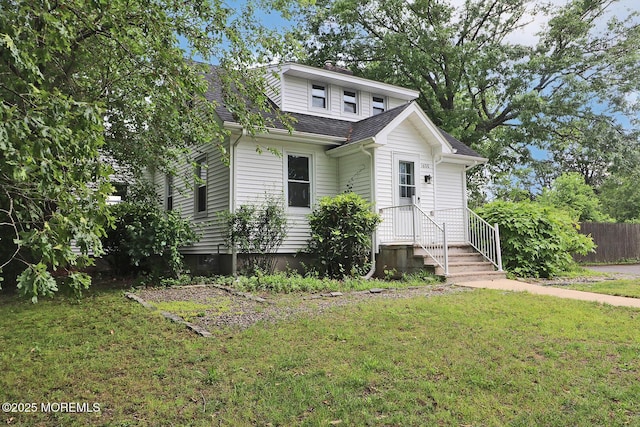 1600 Lawrence Ave, Toms River, NJ 08757 - view of front of house with a shingled roof and a chimney