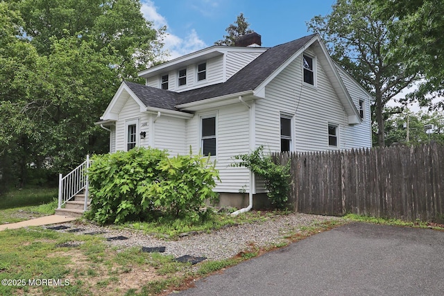 1600 Lawrence Ave, Toms River, NJ 08757 - view of front of property featuring roof with shingles and a chimney