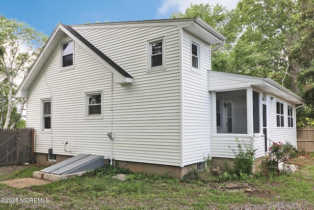 1600 Lawrence Ave, Toms River, NJ 08757 - view of side of home featuring a sunroom