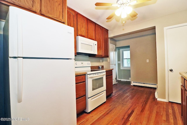1600 Lawrence Ave, Toms River, NJ 08757 - kitchen featuring white appliances, a baseboard radiator, dark wood-type flooring, a ceiling fan, and light countertops