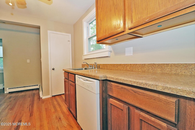 1600 Lawrence Ave, Toms River, NJ 08757 - kitchen with dishwasher, baseboard heating, a sink, light wood-style flooring, and light countertops