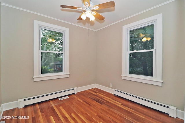 1600 Lawrence Ave, Toms River, NJ 08757 - unfurnished room featuring baseboard heating, wood finished floors, baseboards, ornamental molding, and a ceiling fan