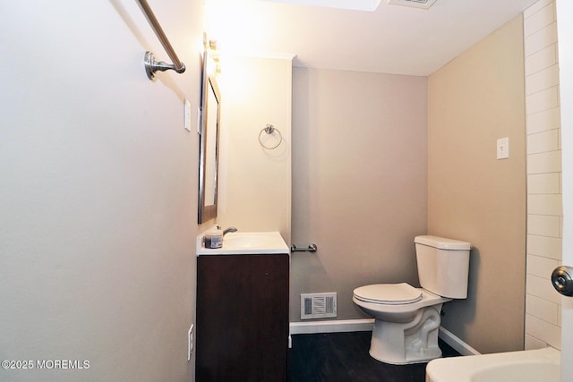 1600 Lawrence Ave, Toms River, NJ 08757 - bathroom with vanity, toilet, and baseboards