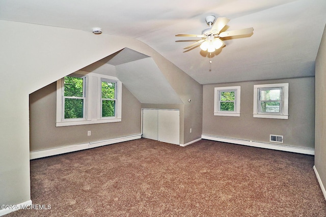 1600 Lawrence Ave, Toms River, NJ 08757 - bonus room featuring baseboard heating, carpet flooring, vaulted ceiling, a ceiling fan, and baseboards