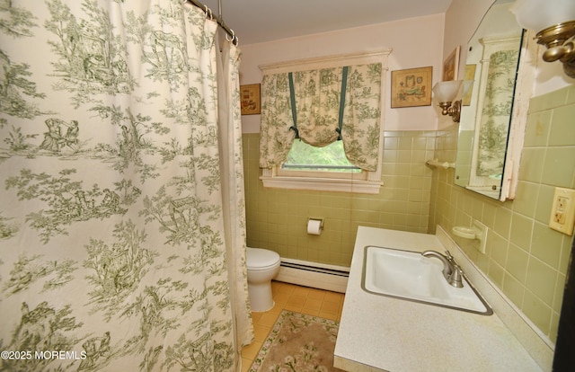 503 Page Ave, Allenhurst, NJ 07711 - full bath with baseboard heating, tile patterned floors, toilet, tile walls, and vanity