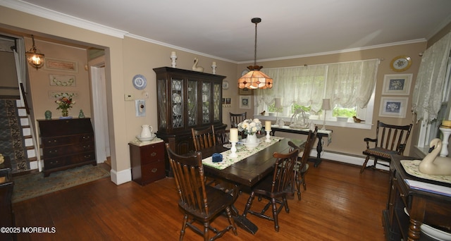 503 Page Ave, Allenhurst, NJ 07711 - dining room featuring wood finished floors, baseboard heating, ornamental molding, and baseboards