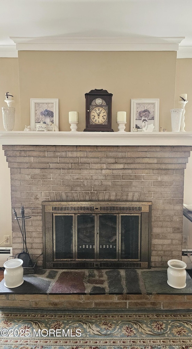 503 Page Ave, Allenhurst, NJ 07711 - detailed view of a fireplace and crown molding