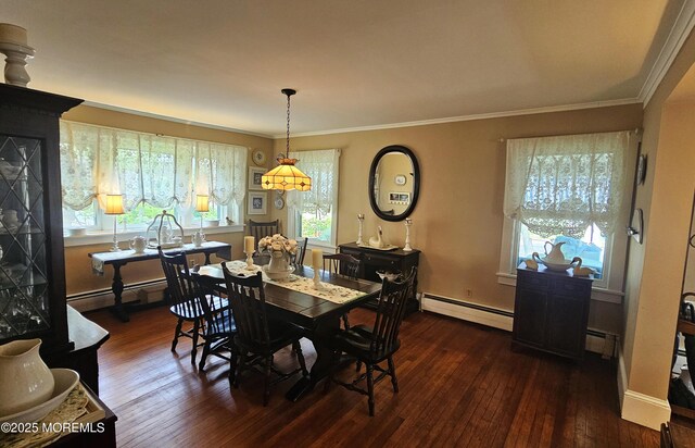 503 Page Ave, Allenhurst, NJ 07711 - dining space with baseboard heating, dark wood-style floors, healthy amount of natural light, and crown molding