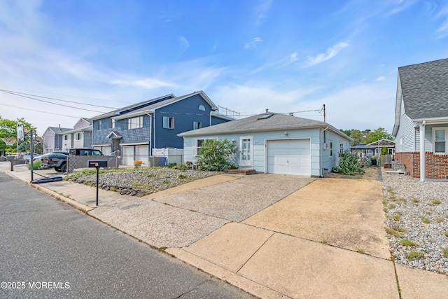 21 Clearwater Way, Toms River, NJ 08753 - view of front of home featuring driveway, a garage, and a residential view