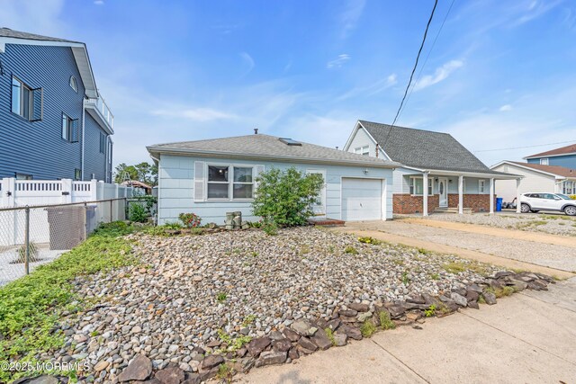 21 Clearwater Way, Toms River, NJ 08753 - view of front facade featuring a garage, covered porch, driveway, and brick siding