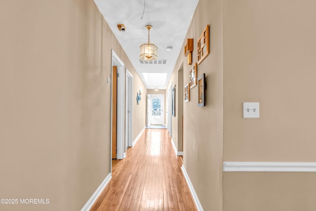 21 Clearwater Way, Toms River, NJ 08753 - hall featuring light wood-style floors, baseboards, and a chandelier