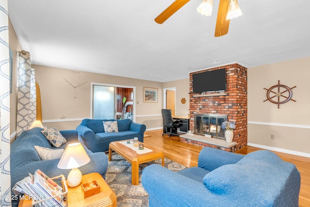 21 Clearwater Way, Toms River, NJ 08753 - living room with a fireplace, wood finished floors, a ceiling fan, and baseboards