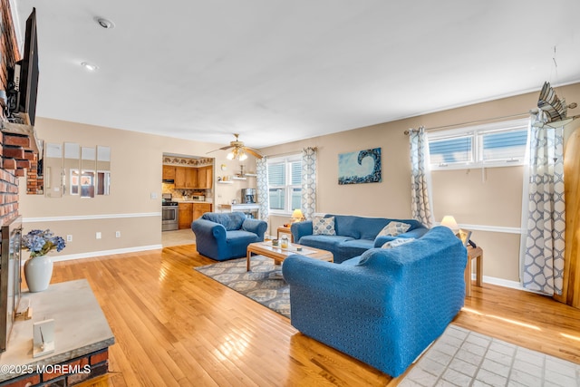 21 Clearwater Way, Toms River, NJ 08753 - living room with a fireplace, light wood finished floors, plenty of natural light, a ceiling fan, and recessed lighting