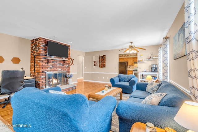 21 Clearwater Way, Toms River, NJ 08753 - living room featuring wood finished floors, a fireplace, ceiling fan, and baseboards