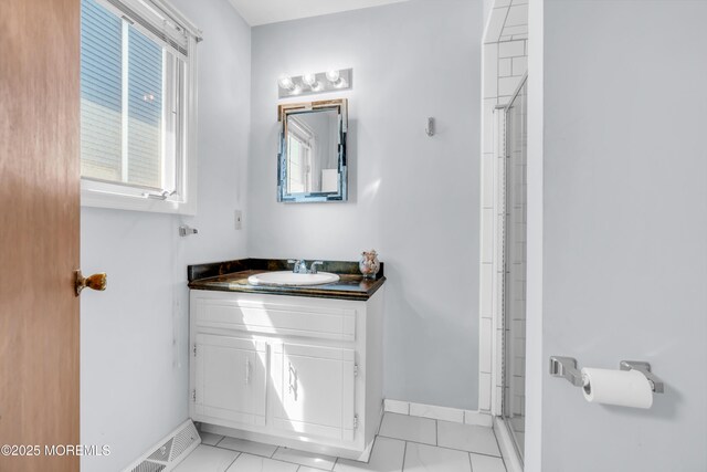 21 Clearwater Way, Toms River, NJ 08753 - bathroom with vanity, baseboards, and a shower