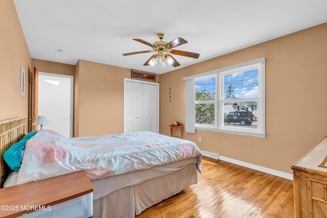 21 Clearwater Way, Toms River, NJ 08753 - bedroom with hardwood / wood-style floors, baseboards, a closet, and a ceiling fan
