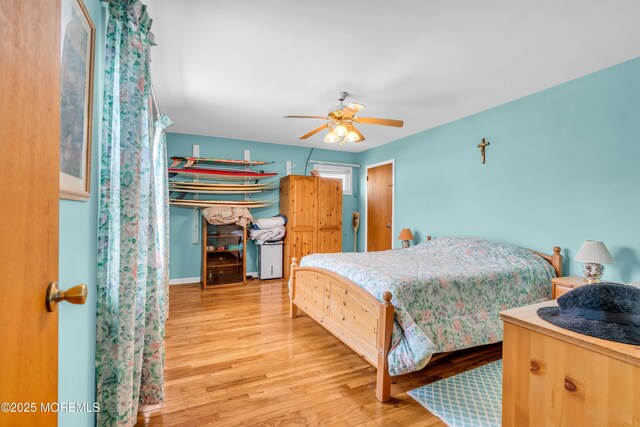 21 Clearwater Way, Toms River, NJ 08753 - bedroom with wood finished floors and a ceiling fan