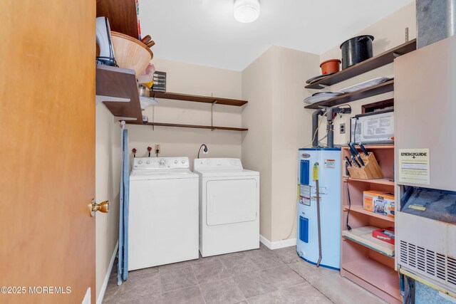 21 Clearwater Way, Toms River, NJ 08753 - laundry area with electric water heater, separate washer and dryer, baseboards, and light tile patterned flooring