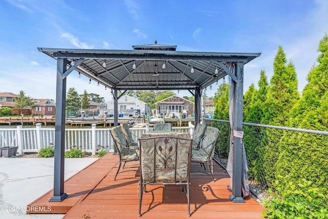 21 Clearwater Way, Toms River, NJ 08753 - wooden terrace with a gazebo, a water view, and outdoor dining space