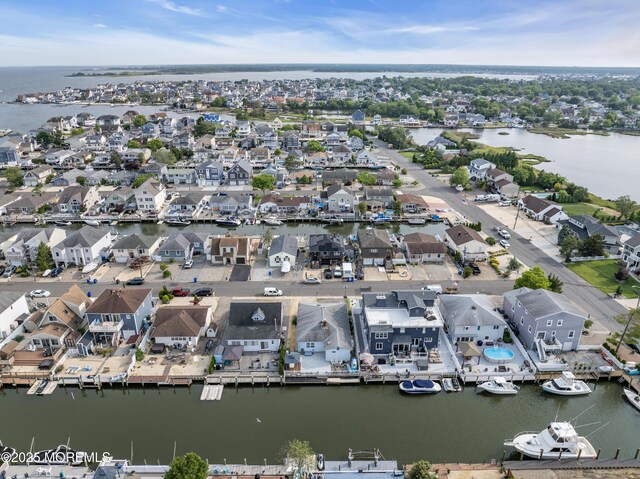 21 Clearwater Way, Toms River, NJ 08753 - aerial perspective of suburban area with a nearby body of water