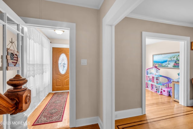 143 Emerson St, Carteret, NJ 07008 - foyer entrance with wood finished floors, crown molding, and baseboards