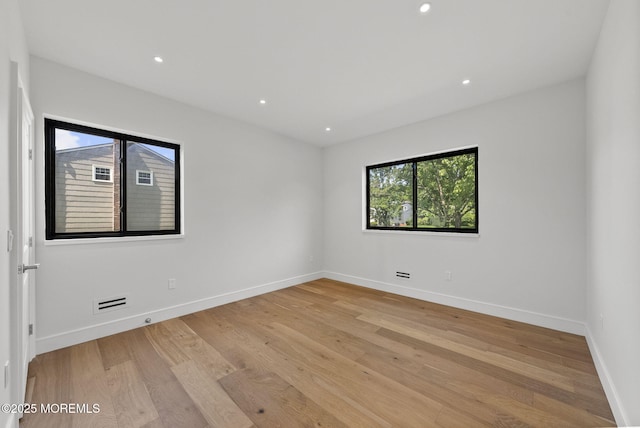 4 Penny Ct, East Brunswick, NJ 08816 - empty room with baseboards, light wood-style flooring, and recessed lighting