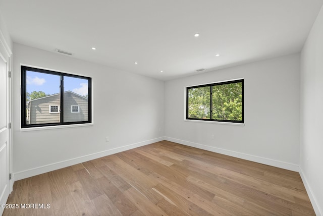 4 Penny Ct, East Brunswick, NJ 08816 - unfurnished room with light wood finished floors, baseboards, and recessed lighting