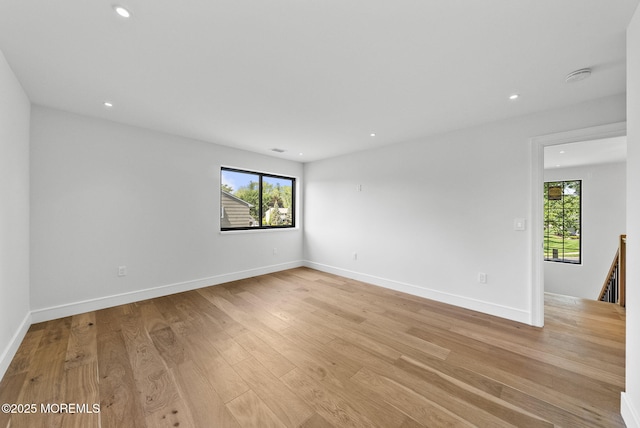 4 Penny Ct, East Brunswick, NJ 08816 - unfurnished room with healthy amount of natural light, recessed lighting, light wood-style flooring, a smoke detector, and baseboards