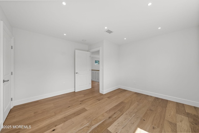 4 Penny Ct, East Brunswick, NJ 08816 - unfurnished room with recessed lighting, baseboards, and light wood-style flooring