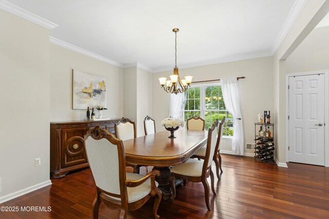 7 Topaz Dr, Jackson, NJ 08527 - dining space with a chandelier, dark wood finished floors, and ornamental molding