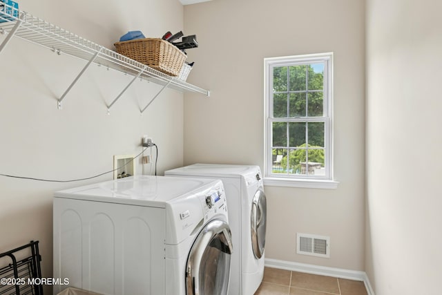 7 Topaz Dr, Jackson, NJ 08527 - washroom with separate washer and dryer and light tile patterned flooring