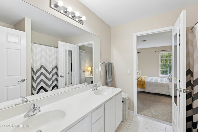 7 Topaz Dr, Jackson, NJ 08527 - ensuite bathroom with tile patterned floors, double vanity, and a shower with curtain